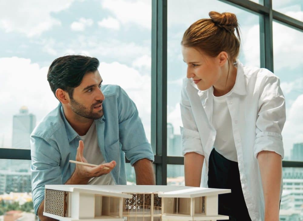 https://www.freepik.com/premium-photo/skilled-architect-team-discussion-about-house-model-construction-tracery_157438591.htm#fromView=search&page=1&position=16&uuid=ded662a9-68bf-4e52-a909-bade1c10cefb&query=Architecture+Companies+in+Chennai%3A+How+to+Choose+the+Right+Firm+for+Your+Home+or+Commercial+Project